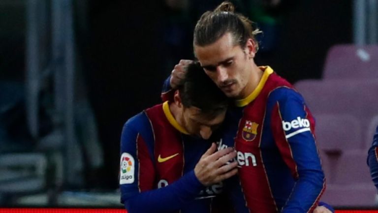 Lionel Messi y Antoine Griezmann en un partido con el Barcelona