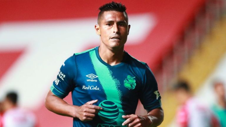 Osvaldo Martínez en un partido con el Puebla