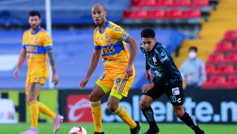 Guido Pizarro en el partido con Tigres