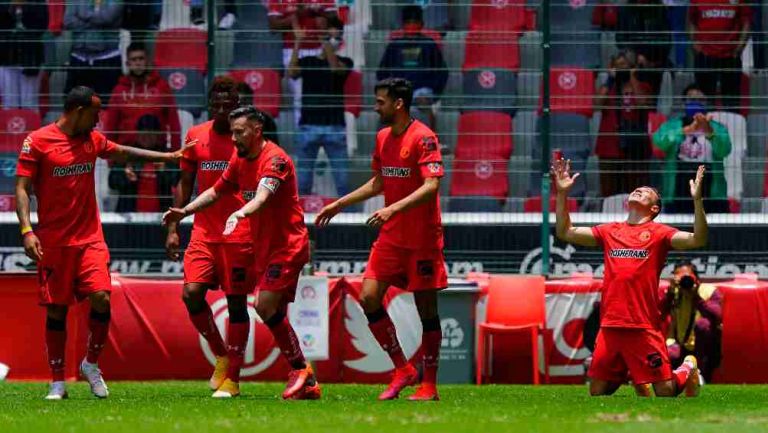 Los jugadores de Toluca festejando el tercer gol del partido