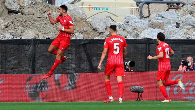 Jugadores del Sevilla en festejo de gol