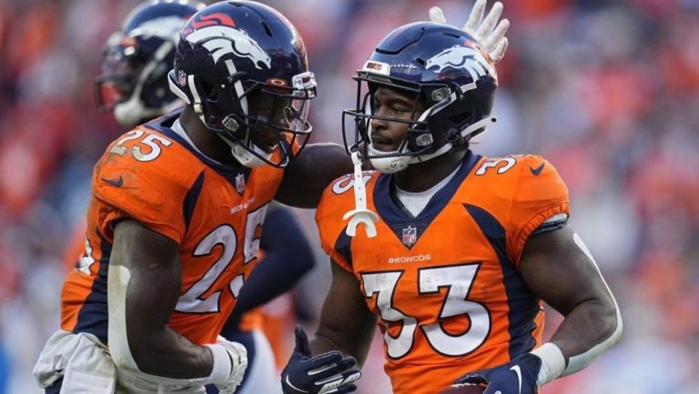 Gordon y Williams en un partido con Broncos 