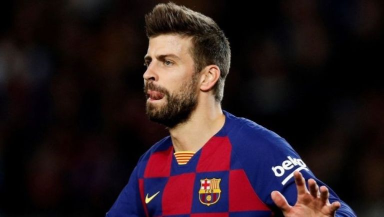 Piqué en un partido con el Barcelona