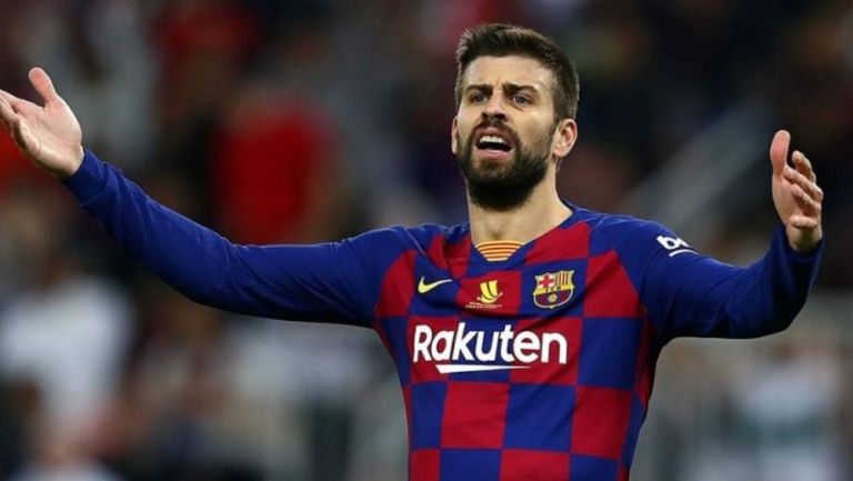 Piqué en un partido con el Barcelona