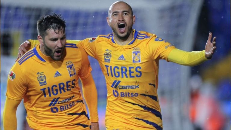 González y Gignac festejando